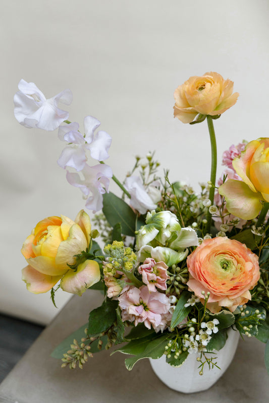 Seasonal small floral arrangement.