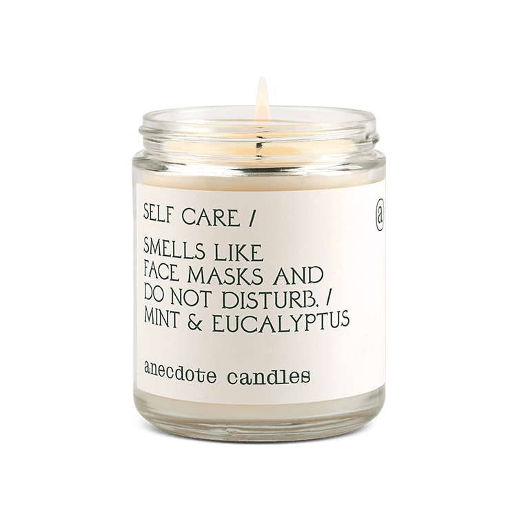 Candle with label that reads Self Care / Smells like face masks and do not disturb. / Mint and eucalyptus.