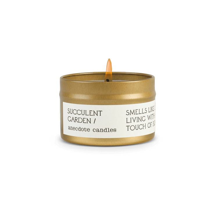 Candle with label that reads Succulent garden.